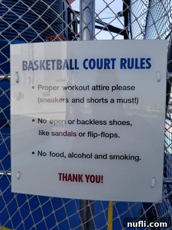 Basketball court rules sign, ensuring fair play and fun for all participants.