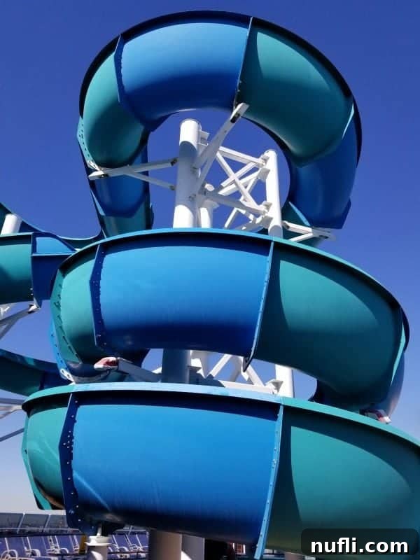 The exciting Carnival Splendor waterslide, promising thrilling twists and turns for adventurous cruisers.