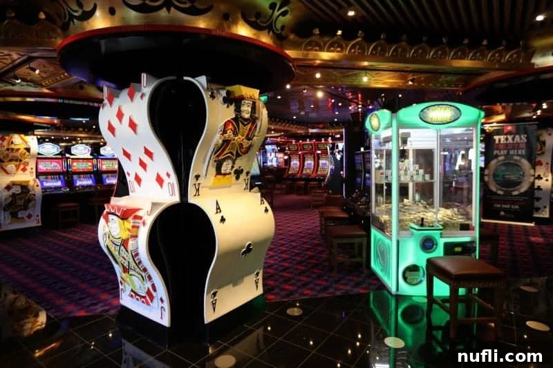 An artistic sculpture made of playing cards, creating a striking focal point within the Carnival Splendor casino.