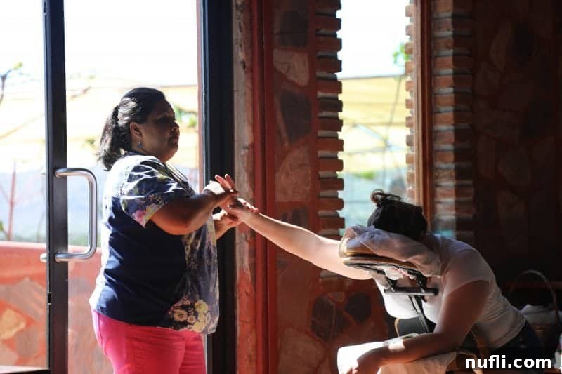 women giving a chair massage 