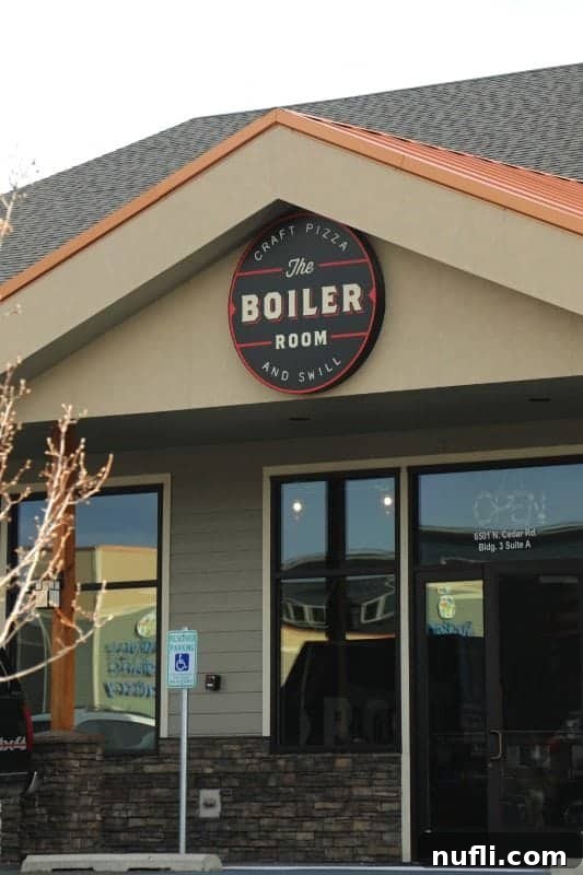 The Boiler Room circle sign over entrance doors