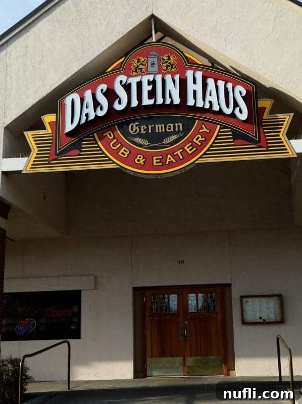Das Stein Haus German Pub & Eatery sign over wooden doors