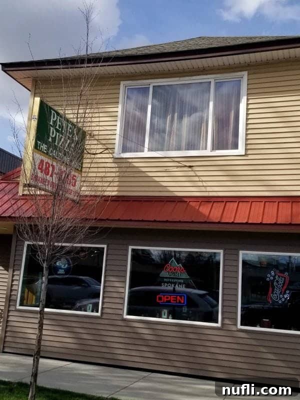 Pete's Pizza exterior with neon lights 