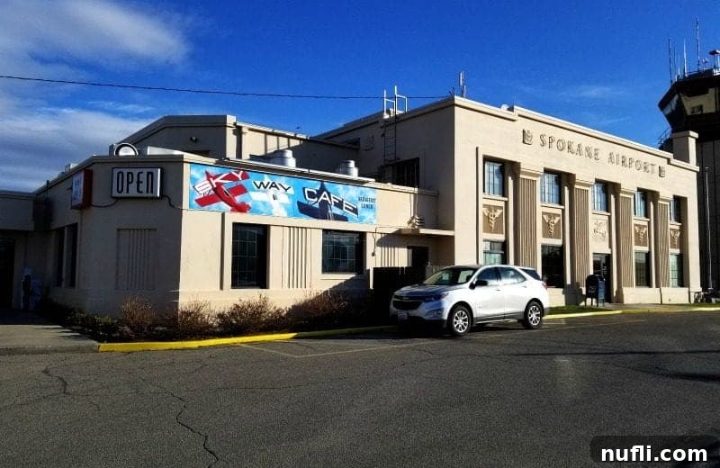 Building with airplane mural on it