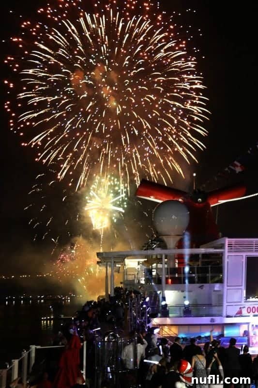 Spectacular fireworks illuminating the night sky over the Carnival Horizon in New York City, creating a stunning visual display