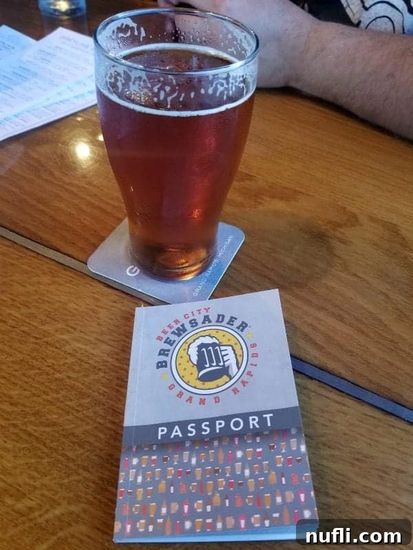 Brewsader passport next to a beer