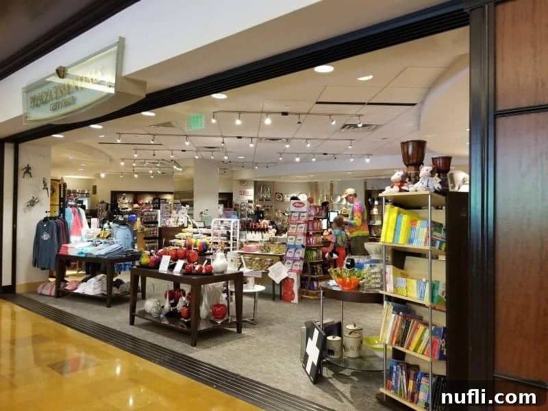 Hotel gift shop displaying books, shirts, souvenirs, and more