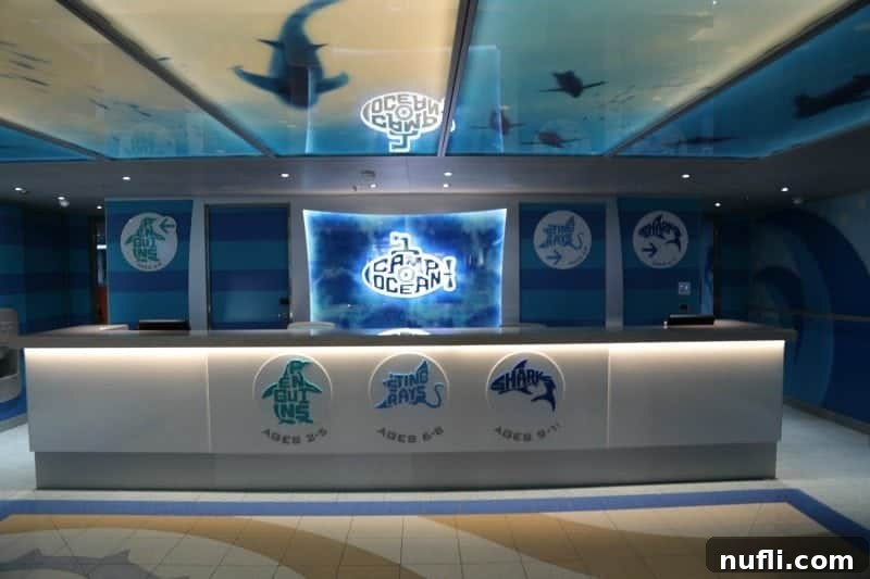 The welcoming Camp Ocean check-in area on the Carnival Horizon, ready for young adventurers to begin their fun.