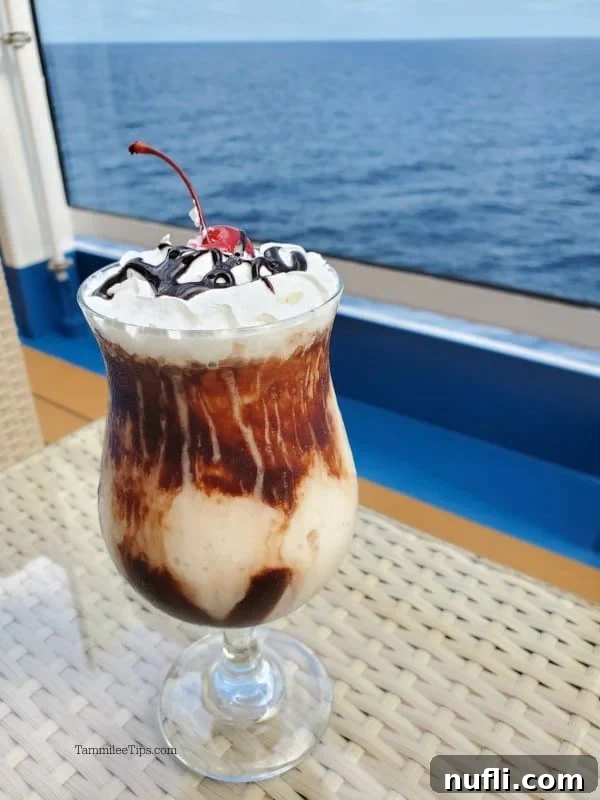 Decadent Mocha Retreat Cocktail 3 A perfectly prepared Mocha Chocolate Getaway Cocktail resting on a wooden table, with the serene ocean visible in the background, hinting at a relaxing getaway.