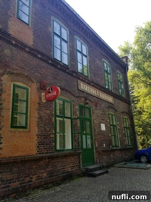 brick building with harenda u barborky on the side 