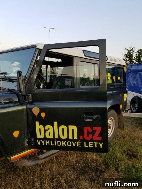 The support vehicle from Balon.cz, a professional hot air balloon operator, parked in the Brno lot.