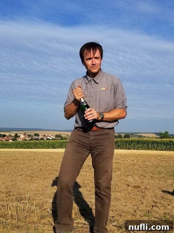 hot air balloon pilot hodling a bottle of champagne 
