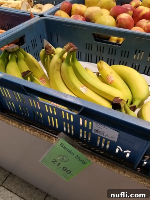 The Real Cost of Groceries in the Czech Republic 11 bananas in a blue basket