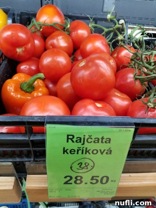 The Real Cost of Groceries in the Czech Republic 12 Tomatoes on the vine with peppers in a basket