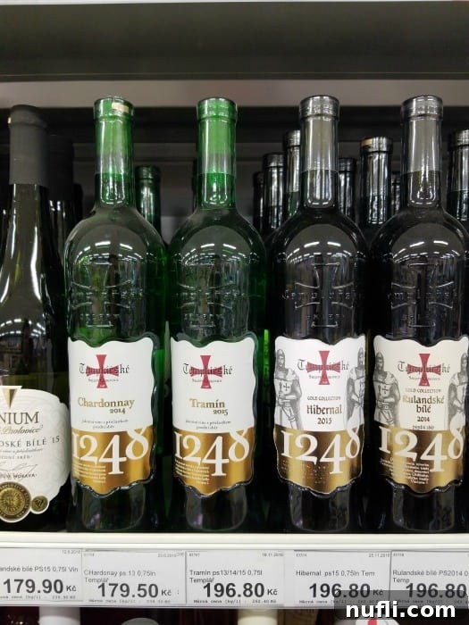 The Real Cost of Groceries in the Czech Republic 6 Tramin 2015 wine bottles on a shelf