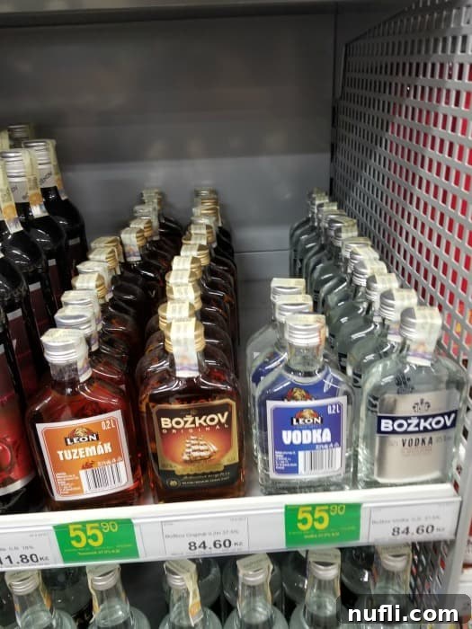 The Real Cost of Groceries in the Czech Republic 7 vodka bottles on a shelf