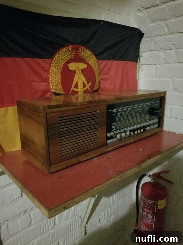 flag behind a radio and fire extinguisher 