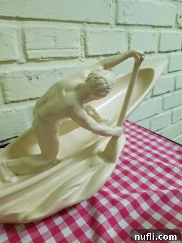 surf kayaker sculpture 