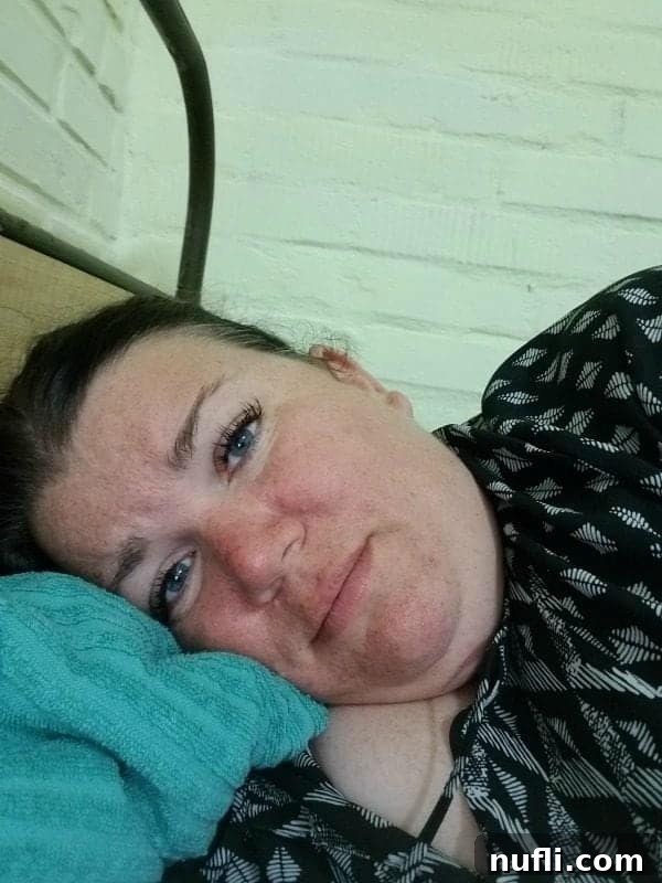 Tammilee laying in bed in a bunker 