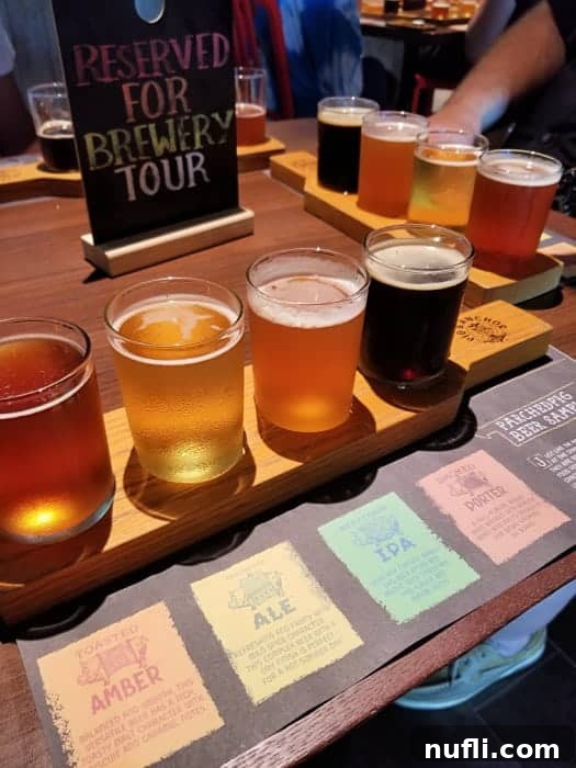 Smoky Bacon Manhattan 8 A 'Reserved for Brewery Tour' sign next to a wooden tray holding four glasses of beer and a beer menu, indicating a special tasting event.