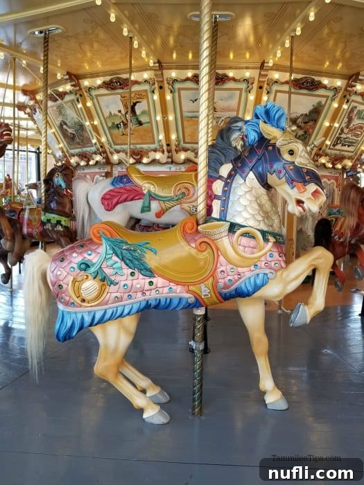 Horse carousel with decorative designs part of the 1928 Spillman Carousel