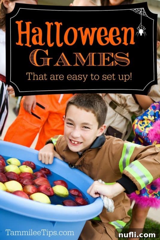 Halloween games over a kid bobbing for apples