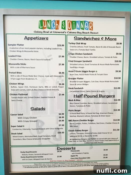 A detailed lunch and dinner menu displayed for Atomic Tonic, showing various food and drink options