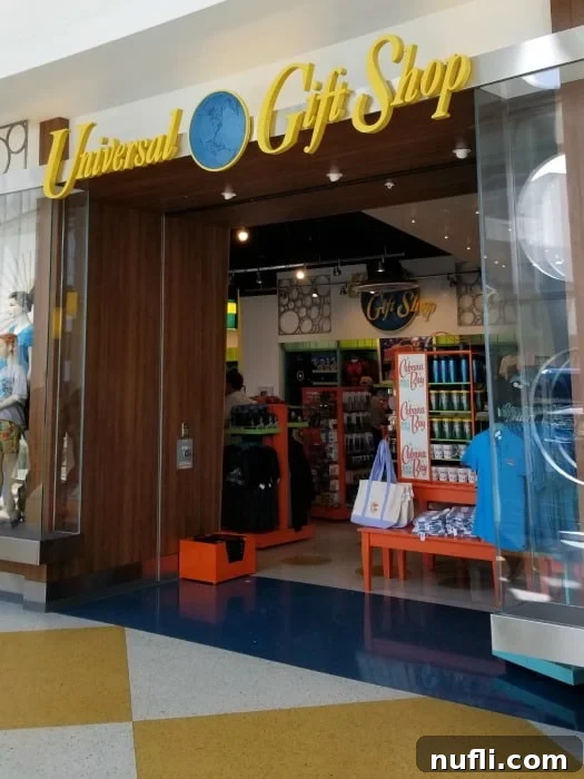 Universal Gift Shop interior stocked with various t-shirts, bags, and souvenirs