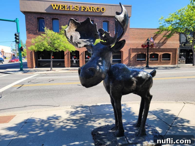 Mudgy Moose sculpture with Wells Fargo in the background