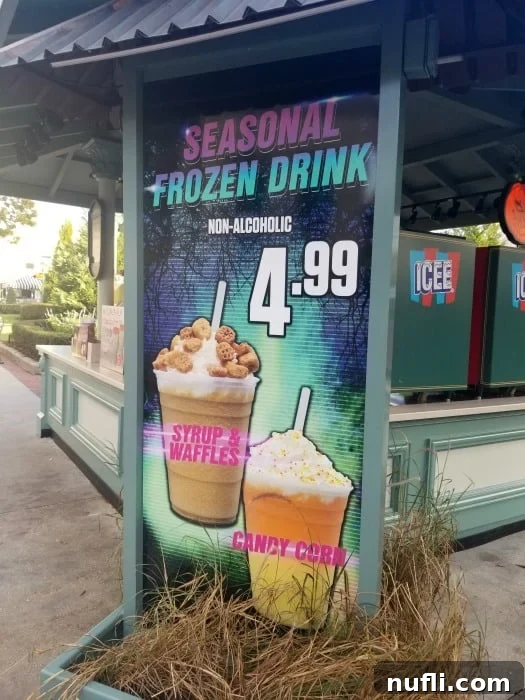 A vibrant sign advertising seasonal frozen drinks at Universal Orlando