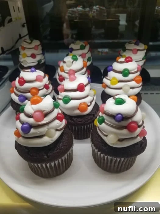 Festive holiday Christmas tree cupcakes, decorated with colorful frosting and sprinkles
