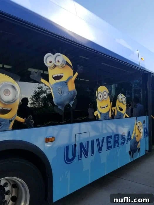 Aventura Hotel Universal Orlando Resort A Modern Getaway 3 Universal shuttle bus with Minions artwork, ready to transport guests to the parks