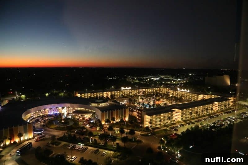 Aventura Hotel Universal Orlando Resort A Modern Getaway 4 Night view from Aventura Hotel, looking over resort lights towards another Universal Orlando hotel