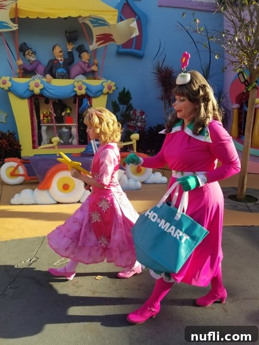 Pink Who from Whoville walking around the village 