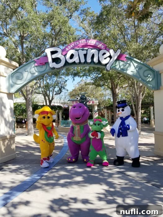 A day in the park wtih Barney, characters dressed for the holidays 