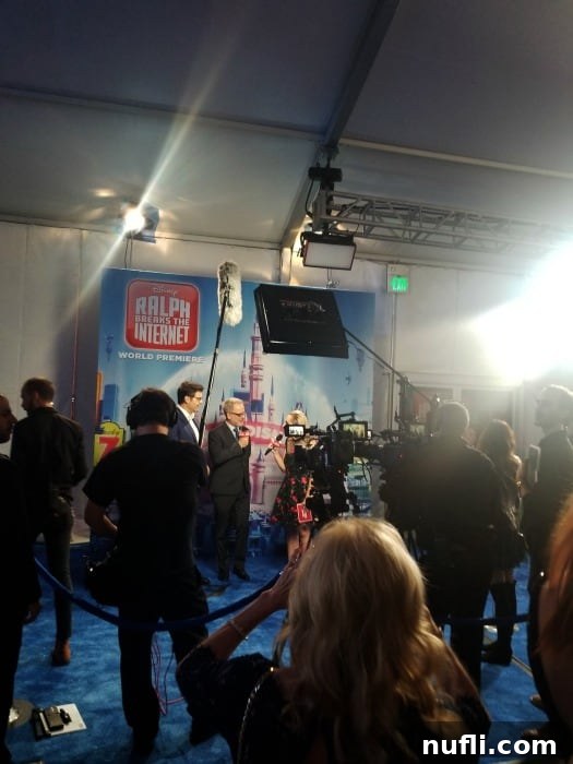 Ralph Breaks the Internet Premieres in Los Angeles 4 Interviews taking place on the blue carpet for Ralph Breaks the Internet premiere, surrounded by large media cameras