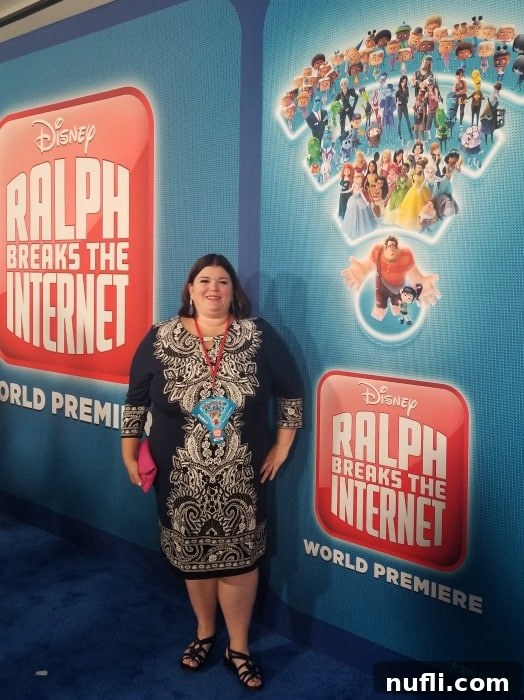 Ralph Breaks the Internet Premieres in Los Angeles 5 Blogger Tammilee posing at the Ralph Breaks the Internet world premiere blue carpet, full of excitement