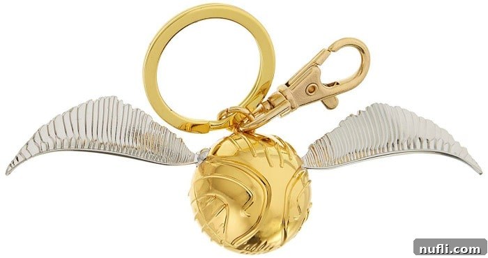 A dazzling Harry Potter Golden Snitch Keychain, a perfect small token of magic for any fan's keys or bag.