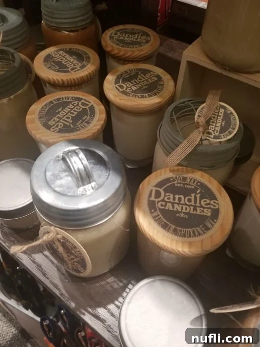 Assortment of Dandles Candles beautifully displayed on a shelf