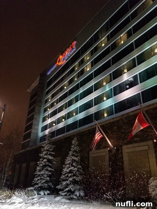 Northern Quest Casino building covered in snow, surrounded by snow-dusted trees