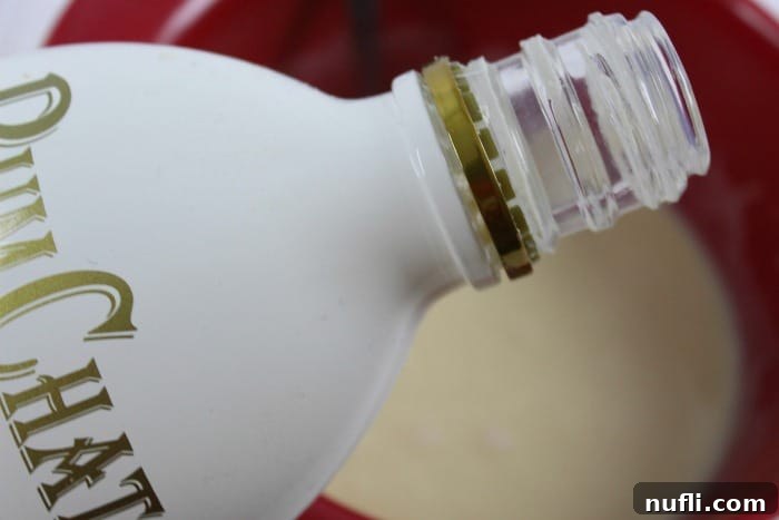 Decadent RumChata Fudge 6 A close-up shot of a RumChata bottle, showcasing its iconic label and creamy contents.