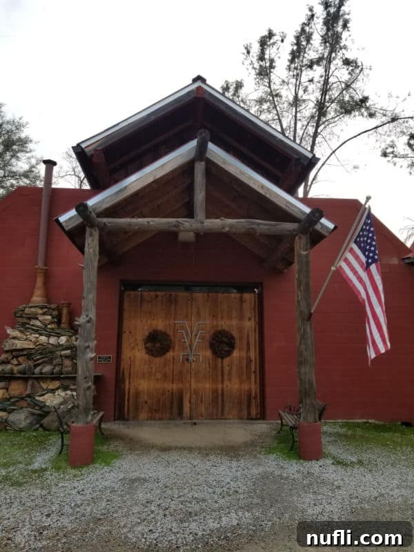 Outdoor entrance to Westbrook Wines cellar, adorned with a proud American Flag.