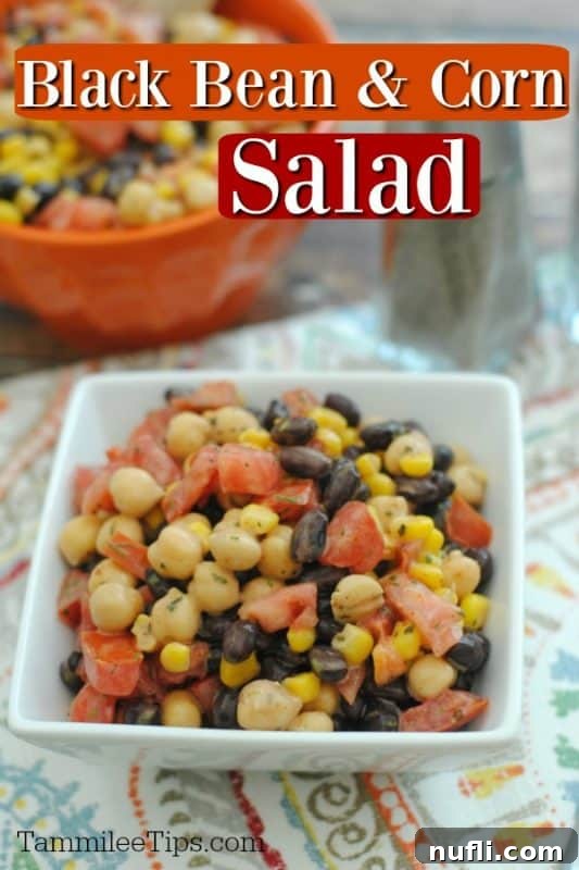 A vibrant bowl of Southwest Black Bean and Corn Salad, rich with black beans, golden corn, and colorful vegetables, garnished with fresh cilantro, ready to be served.