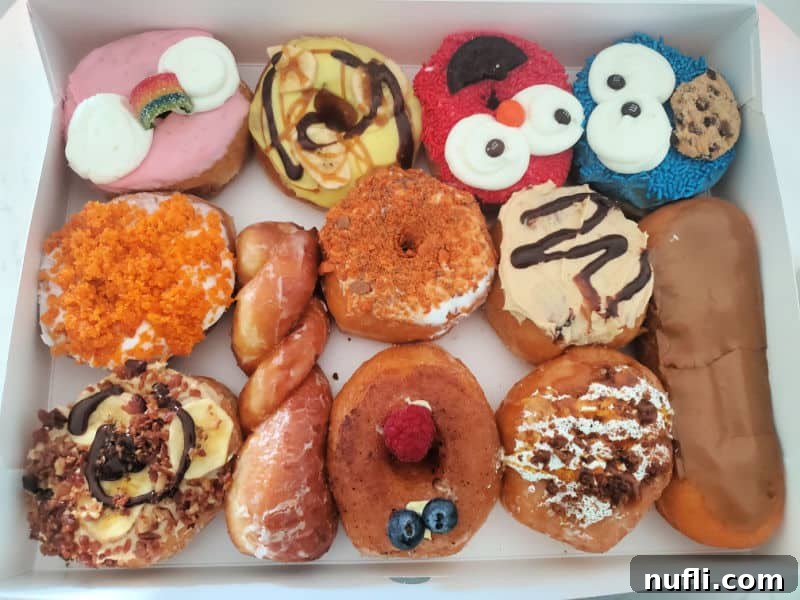 fun donuts in a white box