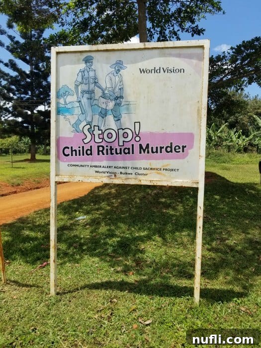 world vision stop child ritual murder sign