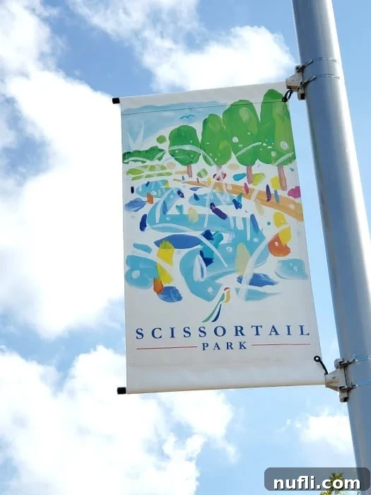 Scissortail Park sign on a pole