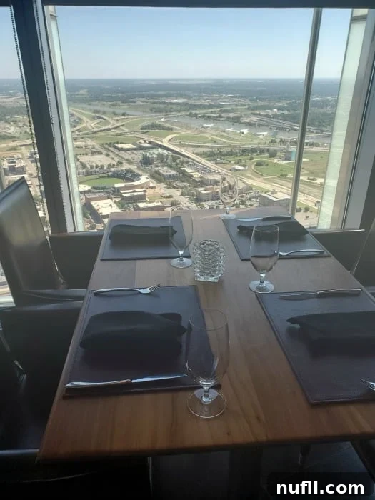 table with place settings looking out over OKC from a high elevation 