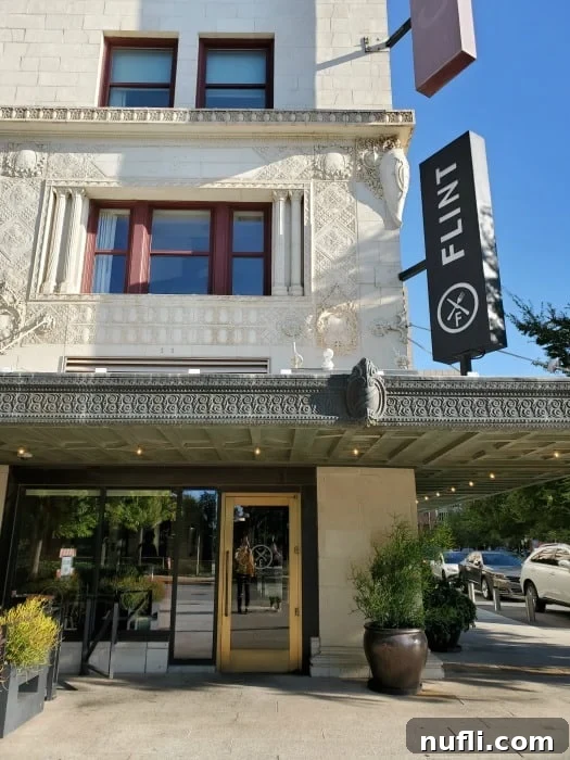 lint sign on the side of a historic building 