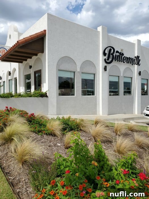 Buttermilk sign on a white building 