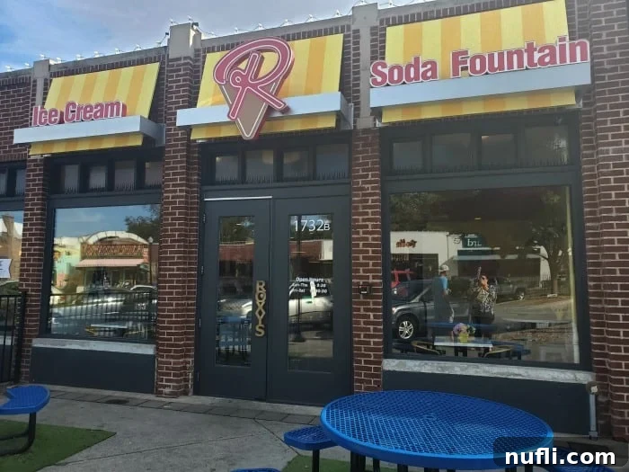 Rocy's ice cream entrance with ice cream and soda fountain on the sign 